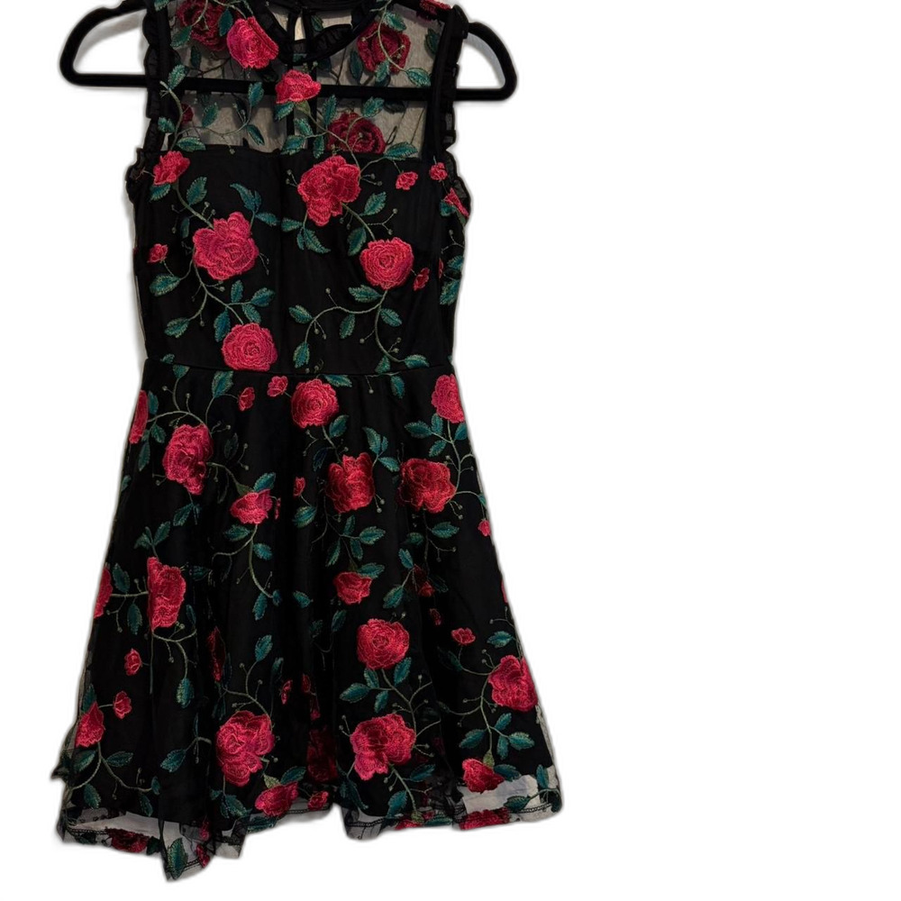 Black dress with Hot Pink embroidered flowers and Green embroidered leaves